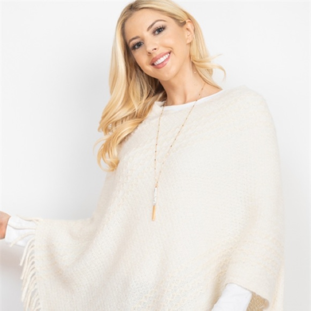 Cream turtleneck poncho! Very cozy and comfortable!